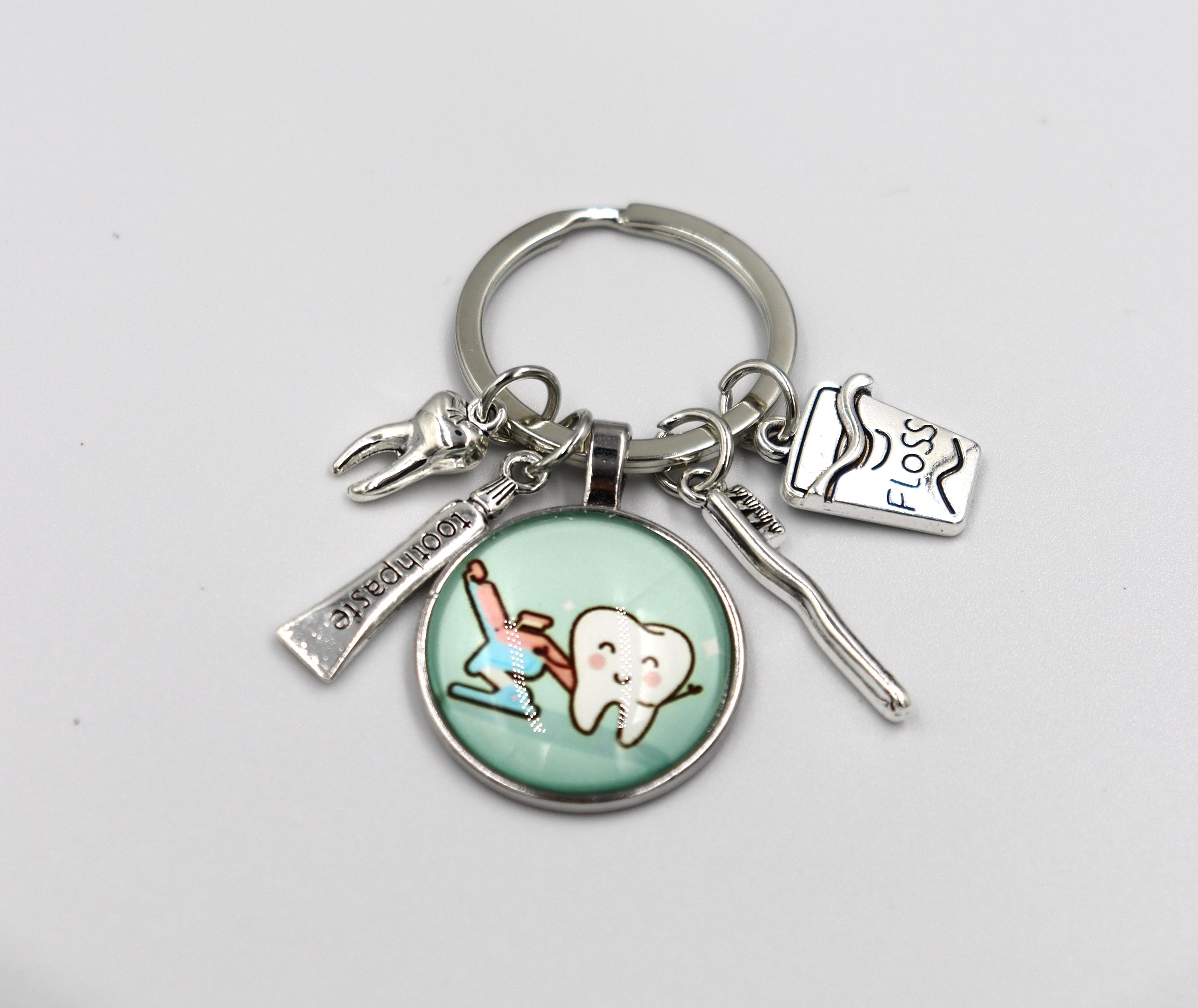 KEY CHAIN FLOSS TOOTHPASTE