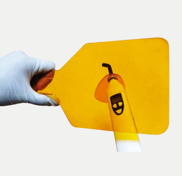 Dental shield UV protection hand-held Orange